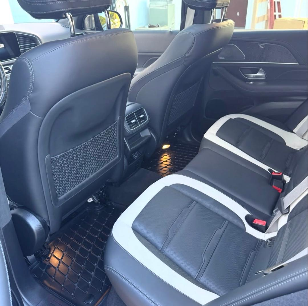 Cleaned rear seats and floor mats in an AMG SUV