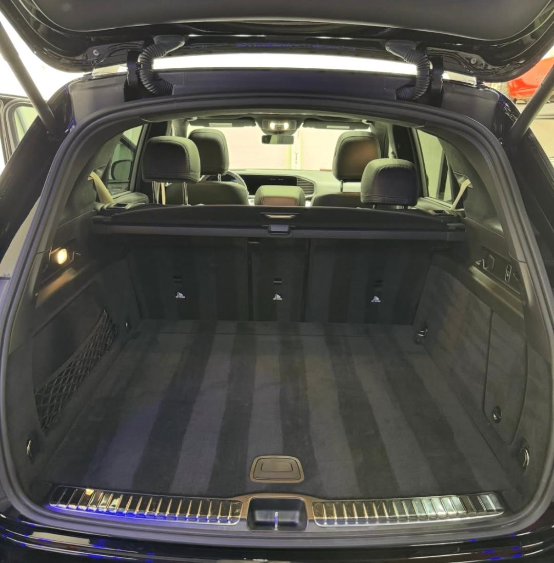 AMG cargo area with freshly vacuumed striped carpet