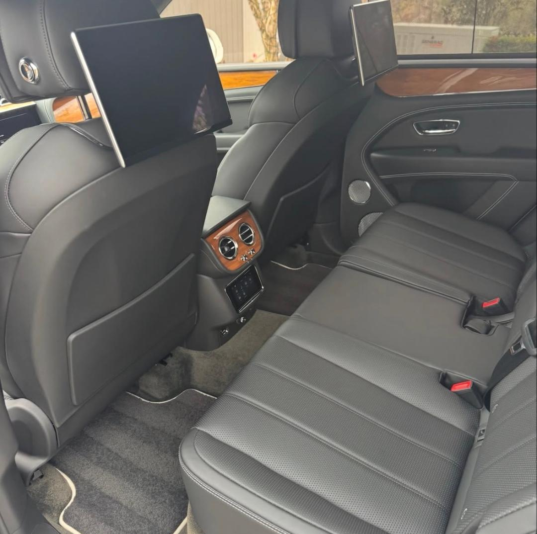 Bentley rear cabin with cleaned leather seating and screens